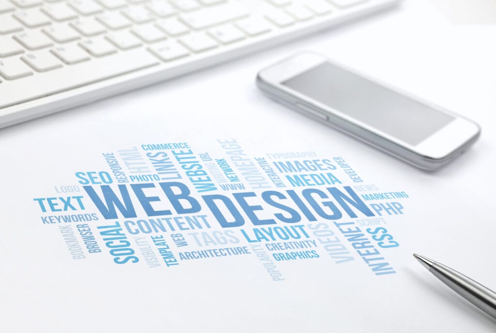 Image of a words related to web design on a table.
