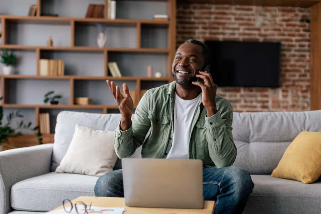 Smiling man on the phone
